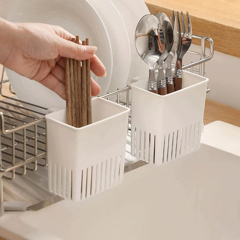 Cutlery Drying Rack - Utensil Drainer - Cutlery Drainer for Sink with chopsticks and silverware in kitchen holder next to sink.