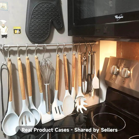 Kitchen Hanging Racks 304 Stainless Steel 20 Inch Rail Utensil Storage Hanger with 10 Pcs Noiseless Sliding Hooks in use above stove.