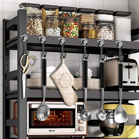 Kitchen storage shelf with jars, utensils, and appliances, including toaster and oven, organized for convenient access.