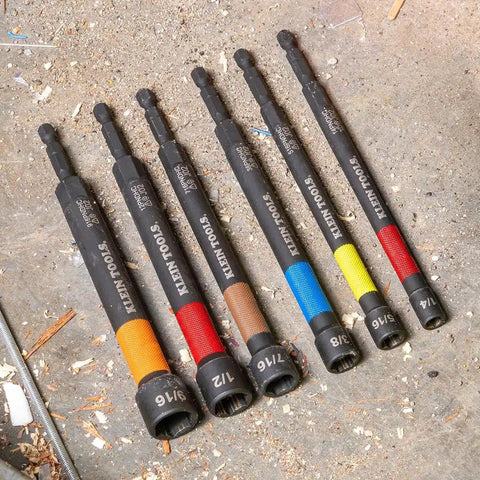 Six Piece SAE Magnetic Impact Nut Setter Set With Color Coded Power Nut Drivers And Extended Reach For Heavy Duty Fastening Includes 1/4 5/16 3/8 7/16 1/2 9/16 Inch Sizes Rare Earth Magnets For One Hand Driving Klein Tools 32930 displayed on workshop floor.