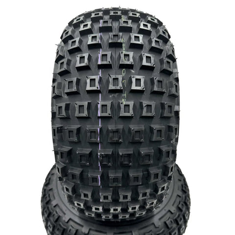 Close-up of Set of 2-18x9.50-8 Knobby Wheel Assembly showing tire tread pattern