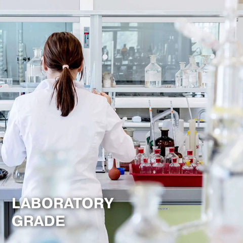 Scientist in lab using Isopropyl Alcohol 99.9% Technical Grade, 32 Oz Bottles Four Pack, High Purity Cleaning Solvent For Labs And Electronics