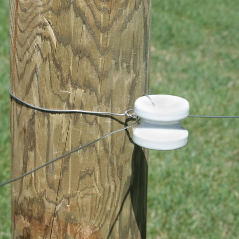 White ceramic corner post insulator for wood posts used with electric fencing