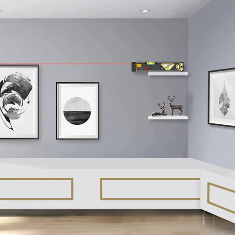 Versatile 2-in-1 laser level blends a 12 inch spirit level with a bright red laser, magnetic base, and long reach used for hanging pictures