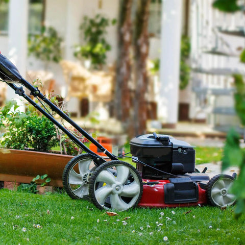 Lawn mower fitted with 12 Inch Rear Lawn Mower Wheels Replacement for Arnold 490-324-0002, 12x1.75 plastic wheels in a garden