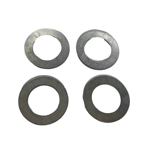 Four metal gaskets from Front Wheel Bearing Kit For Lawn Mower Fits LA Series Includes Four Bearings Six Gaskets Two Rubber Sleeves Two Clips