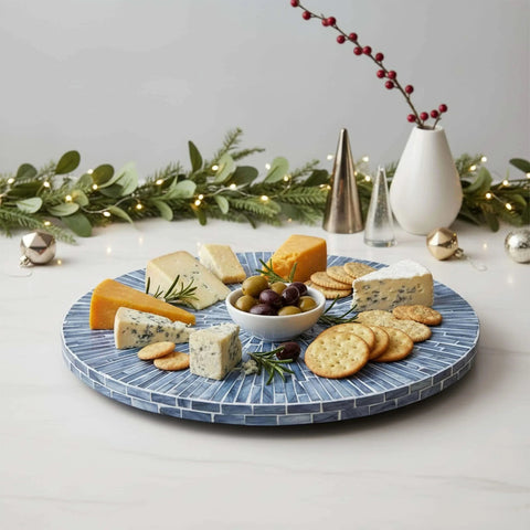 12.6 inch mother of pearl lazy susan turntable with blue starburst design, decorative rotating tray with cheese and crackers.