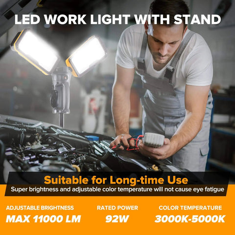 Mechanic using Ultra Bright LED Work Light With Telescoping Tripod, Beast Mode Brightness, Dual Head Design, 11000 Lumen, 92W Dimmable