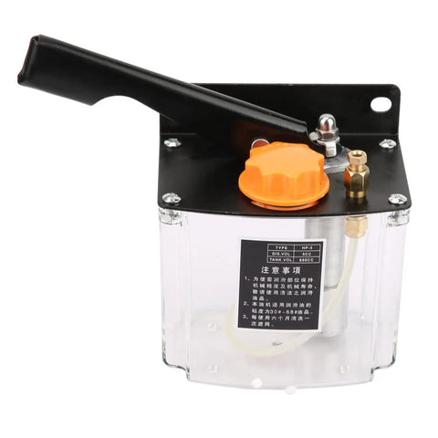 Left Hand Operated Manual Lubrication Pump For CNC Machine Tools with 650cc capacity and 4mm piston, clear tank with orange cap.