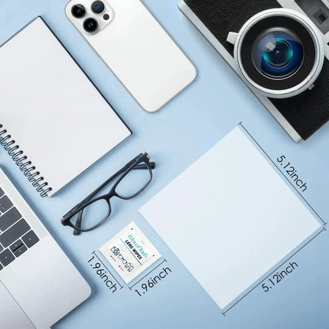 Pre-Moistened Lens Wipes For Eyeglasses Individually Wrapped Streak Free pack next to glasses and camera lens.
