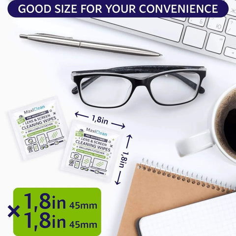 Individually Wrapped Lens Wipes For Glasses And Devices Streak Free Clarity next to glasses, pen, keyboard, and coffee cup.