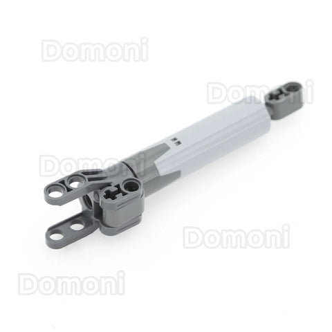 Lego-compatible gray linear actuator with mounting bracket and end connector; Domoni watermark.
