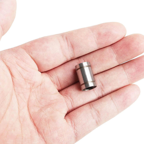 Person holding a 6mm bore ✝️ 12PCS LM6UU Linear Bearings, 6mm Bore Dia Linear Motion Bushing with Double Side Rubber Seal Great for CNC Machine