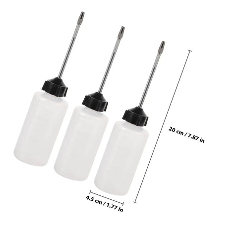 Three Long Mouth Nozzle Oil Bottles For Sewing Machines And Home Tools illustrating clear plastic design and easy pour spouts
