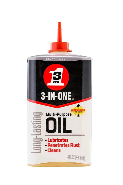 3-IN-ONE Multi-Purpose Oil, 8 OZ squeeze bottle with red precision spout, labeled for lubrication, rust protection, and cleaning.