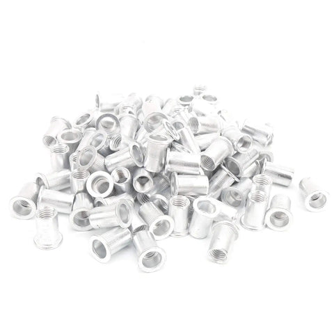 M10 Aluminum Pull Riveting Nuts Flat Head For Tight Spaces 100 Pcs Set WJ30045 in a pile, suitable for heavy duty use