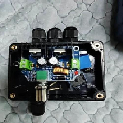 Installed 2 Pack M32 Cable Gland Waterproof Plastic Glands Joints Adjustable Connector Black For 16 To 21mm Cable Diameter Built Tough Dustproof PA6 Nylon Sealed Weatherproof Entry Fits Industrial Enclosures And Outdoor Electrical Boxes in an open electrical box