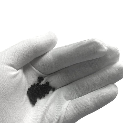 Hand holding M3x3mm Metric Carbon Steel Hex Socket Set Flat Point Grub Screws Black, ideal for towel racks and door knobs, 50pcs