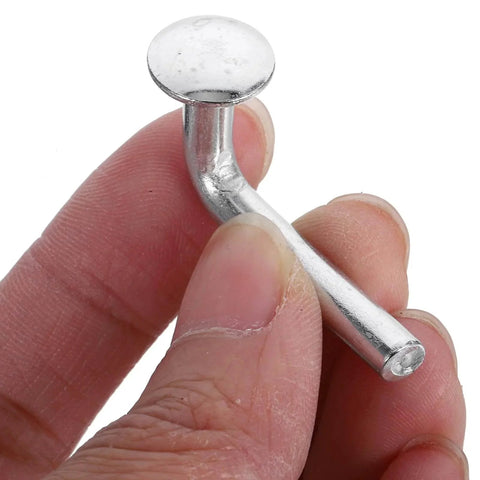 Close-up of a single Pallet Rack Drop Pin, M5x5mm J Bolt Safety Clip, held between fingers, steel material for warehouse and home shelving.