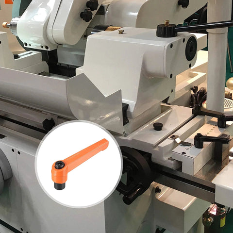 Set of 3 M8 Adjustable Clamping Lever Push Button Ratchet Handles with Female Threaded Studs shown on machinery setup.
