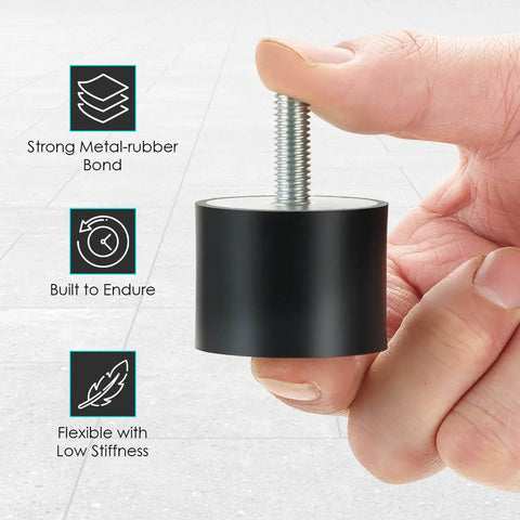 Close-up of a person holding one 4 Pack M8 Rubber Isolator Mounts 40x30mm Anti Vibration Shock Absorbers With Studs And Nuts.