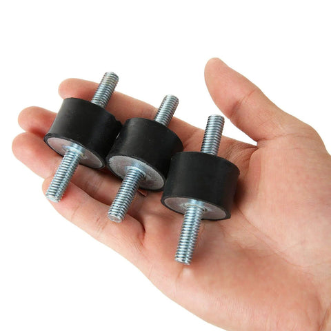 Hand holding three Eight M8 Rubber Vibration Isolator Mounts Cushion Machinery Absorb Shocks Reduce Noise And Protect Air Compressors