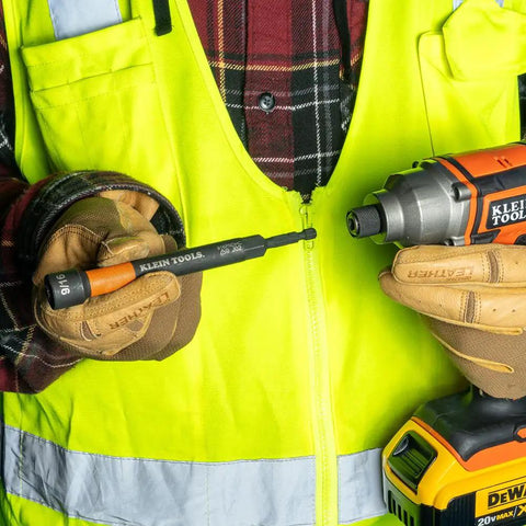 Worker using Six Piece SAE Magnetic Impact Nut Setter Set With Color Coded Power Nut Drivers And Extended Reach For Heavy Duty Fastening Includes 1/4 5/16 3/8 7/16 1/2 9/16 Inch Sizes Rare Earth Magnets For One Hand Driving Klein Tools 32930