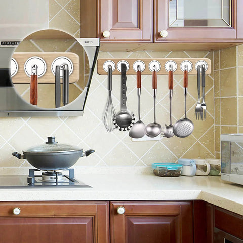 Beefy Six Pack Neodymium Cup Magnets Set With 110 Pound Holding Power used for hanging utensils in a kitchen