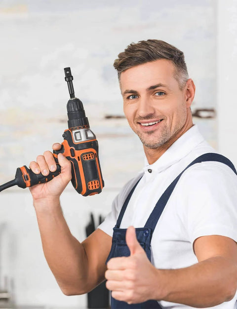 Man holding a drill with 3/8 Impact Adapter, 4 Pack Socket Adapter 1/4 Inch to 3/8 Socket Adapter Kit for Impact Driver in workshop