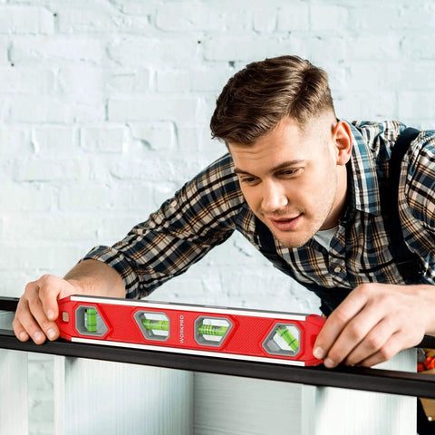 Person using 12 Inch Torpedo Level, Magnetic Small Leveler Tool, Plumbing Level with Pitch Vial, Aluminum Reinforced, 4 Bubbles, V-Groove.