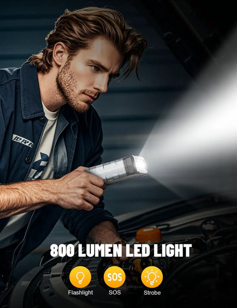 Man using an 800-lumen LED light from High Power 5000A Car Jump Starter Lithium Battery Pack For 10.0L Gas And 9.0L Diesel Engines