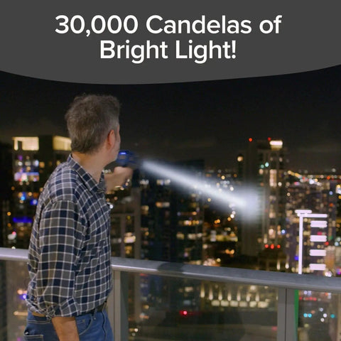 Person using As Seen On TV Mega Bright Rechargeable Spotlight With 10 Modes And Turbo Boost on balcony at night.