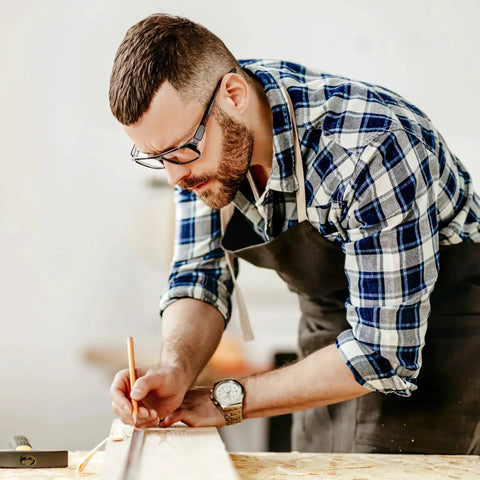 Craftsman wearing slip on safety glasses side shields 2 pairs transparent anti slip protectors in a workshop