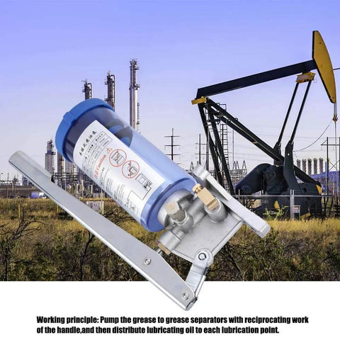 Manual Grease Pump LSG05 Hand Operated Lubricator with aluminum alloy construction in front of an oil field