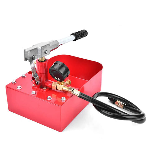 Manual hydraulic pressure test pump with red metal base, brass fittings, gauge, and black hose.