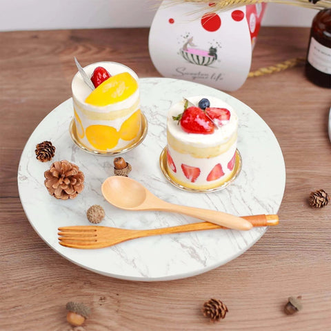 Marble lazy susan turntable designed as a cheese board and cake stand, 12 inch natural white marble rotating tray with desserts.