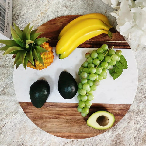 Large Marble And Acacia Wood Lazy Susan Turntable Rotating Serving Tray with bananas, grapes, avocados, and pineapple