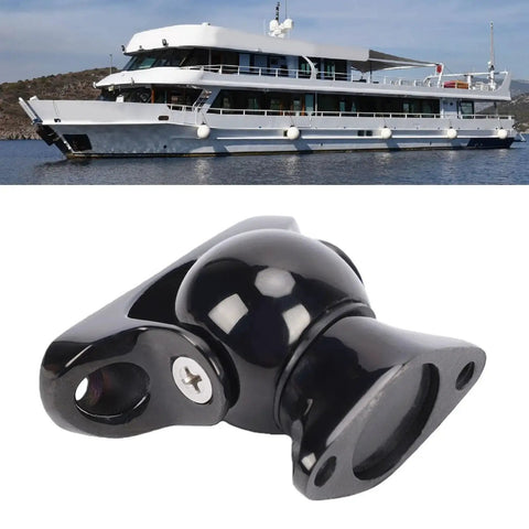 Door stopper magnet, marine-grade stainless steel, black finish; yacht in background.