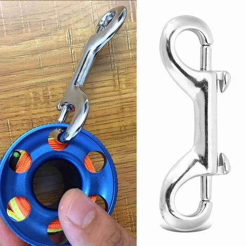 Hamwesh double-ended stainless steel snap hook attached to rope and blue pulley; chrome trigger snap hook close-up.