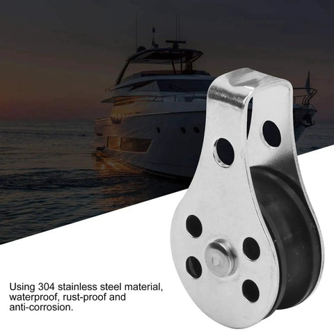 Close-up of stainless steel bearing wheel pulley, 25mm, 2 pcs, marine grade 304 rustproof.