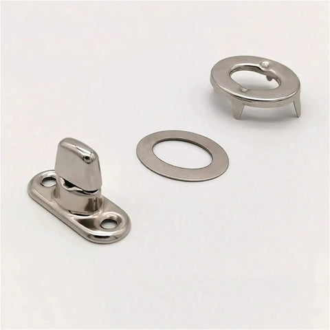 Front view of stainless steel marine twist-lock fasteners: base plate with stud, flat washer, and locking ring.