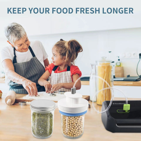 Mason jar canning sealer kit with hoses for FoodSaver, white, shown with jars on kitchen counter.