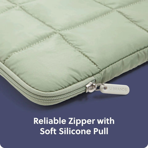 Close-up of Matcha Green Puffy Nylon Laptop Sleeve With Zipper Medium 13 Inch Case detail showing reliable zipper and soft pull.