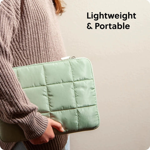 Person holding Matcha Green Puffy Nylon Laptop Sleeve With Zipper Medium 13 Inch Case Fits Up To 14 Inch Laptops