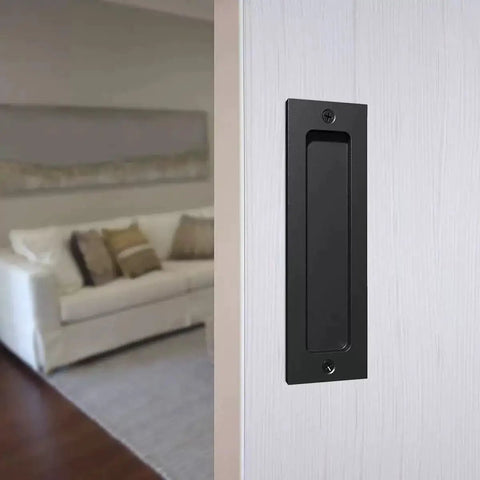 Flush Sliding Barn Door Handle Heavy Duty Finger Pull With Rectangular Plate Matte Black Finish Ideal For Sliding Barn Doors Cabinets Closets And Drawers No Sharp Edges Smooth Operation Durable Rust Resistant Construction One Piece Eight Point Six Six installed on a white door