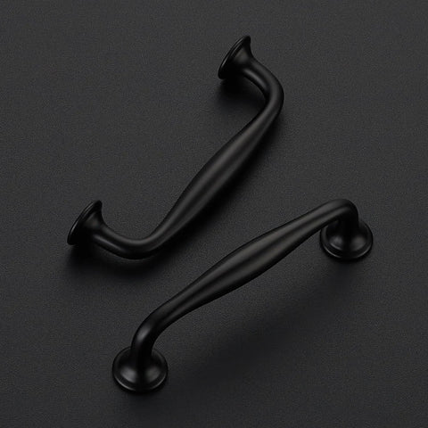 10 Pack Matte Black 3-3/4 Inch Kitchen Cabinet Handles Solid Zinc Alloy Cupboard And Drawer Pulls on black surface