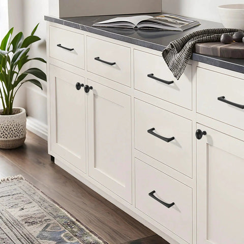 10 Pack Matte Black Oval Cabinet Knobs Single Hole Cabinet Pulls For Dresser And Kitchen Cabinets, installed on white kitchen cabinets