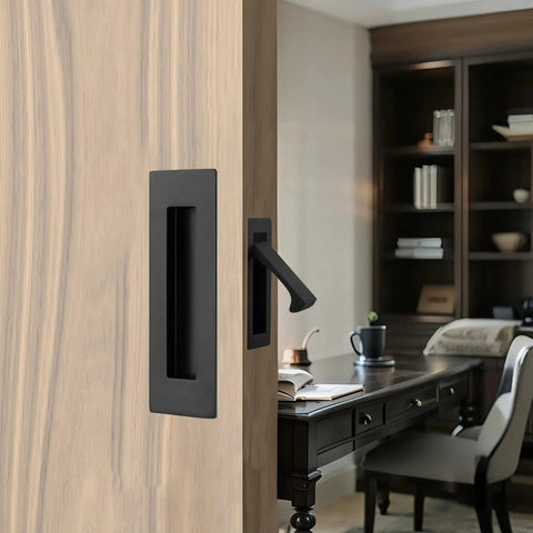 Matte Black Stainless Steel Pocket Door Pull And Edge Pull Set installed on a recessed sliding door in home office
