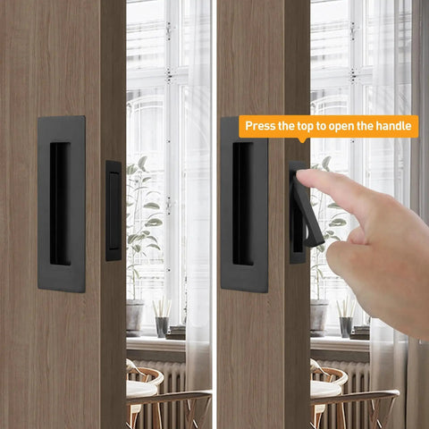 Matte Black Stainless Steel Pocket Door Pull And Edge Pull Set for recessed sliding doors, shown on wooden door frame.