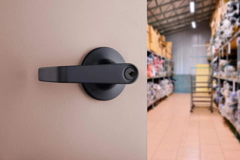 Brinks Commercial 4 Pack Light Duty Keyed Door Entry Storeroom Lever Matte Black installed on storeroom door
